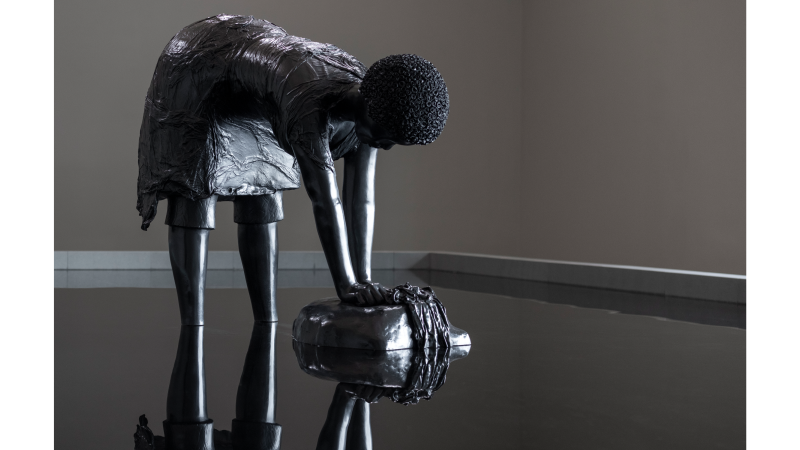 Simone Leigh, Last Garment, 2022, bronze, steel, metal, filtration pump, and water, 54 × 58 × 27 in. (137.2 × 147.3 × 68.6 cm) (sculpture); dimensions variable (pool), installation view, Simone Leigh, the Institute of Contemporary Art/Boston, 2023, © Simone Leigh, courtesy the artist and Matthew Marks Gallery, photo by Timothy Schenck 