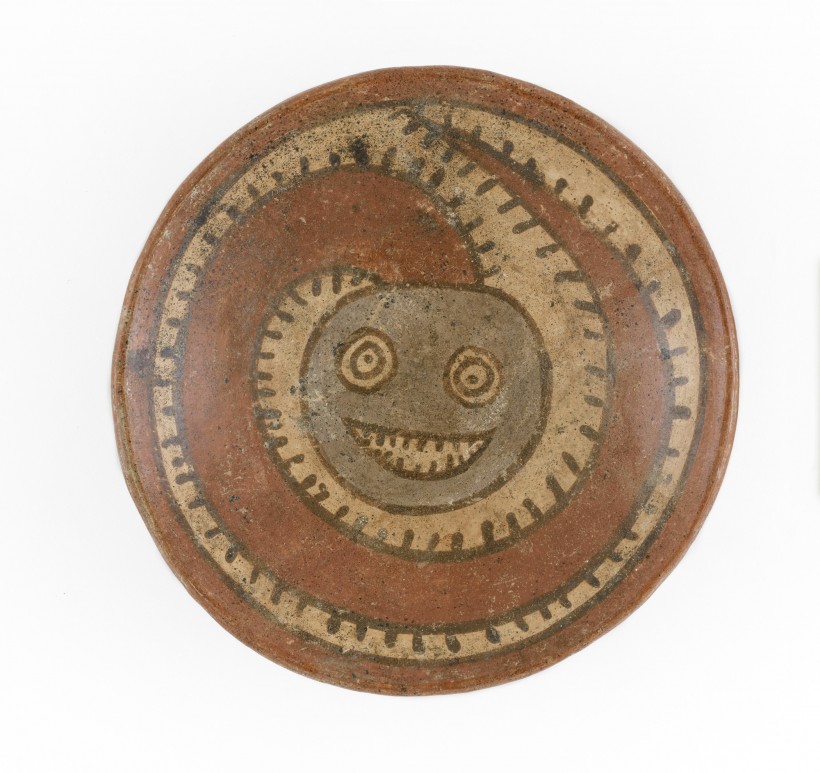 Image: Plate with Smiling Serpent, Millipede, or Tadpole Creature, Panama, Conte Style, 600–800 CE