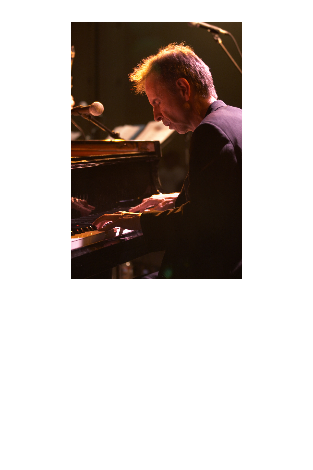 Bill Cunliffe Headshot at the piano