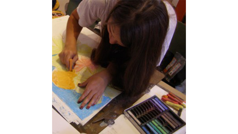 Teen working on art project