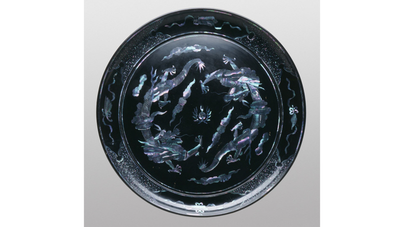 Circular Tray with Two Dragons Chasing a Flaming Pearl, about 1700-1800, Ryūkyū Islands, Los Angeles County Museum of Art, gift of Mr. and Mrs. H. K. Lee in memory of Major-General E. F. Easterbrook, photo @ Museum Associates/LACMA