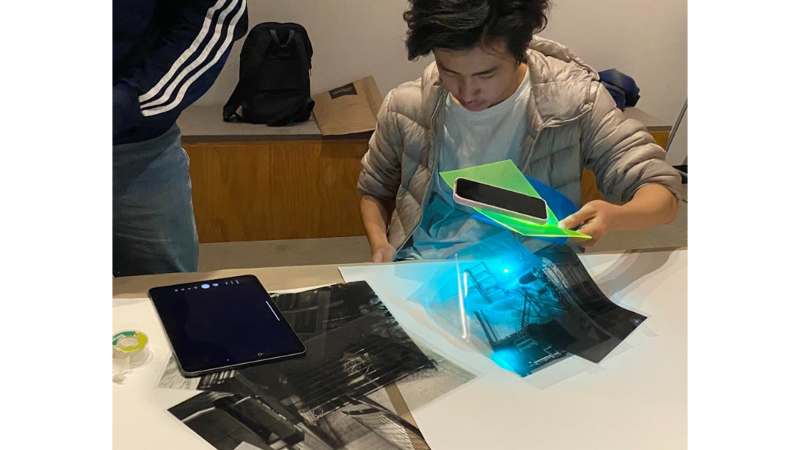 young person working with photo negatives for a LACMA teen internship
