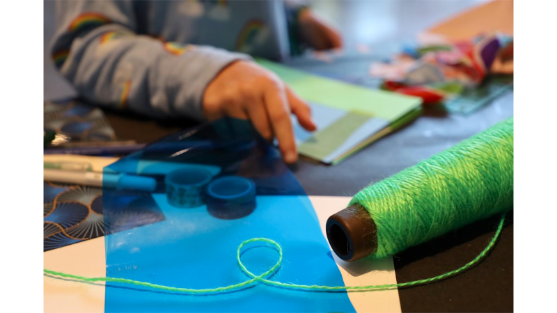 array of art materials across table