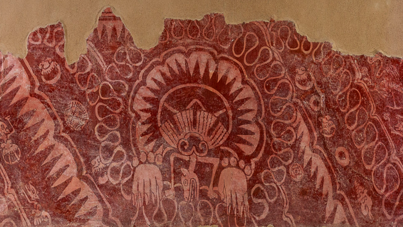 Mural Fragment of Scalloped Shell with Hands and Animal Head (detail), 350–450 CE, Teotihuacan, Lime plaster with pigment, 16 1/2 x 42 7/8 in. (42 x 109 cm), Museo de Murales Teotihuacanos, Beatríz de la Fuente, photo © Museum Associates/LACMA, by Javier Hinojosa
